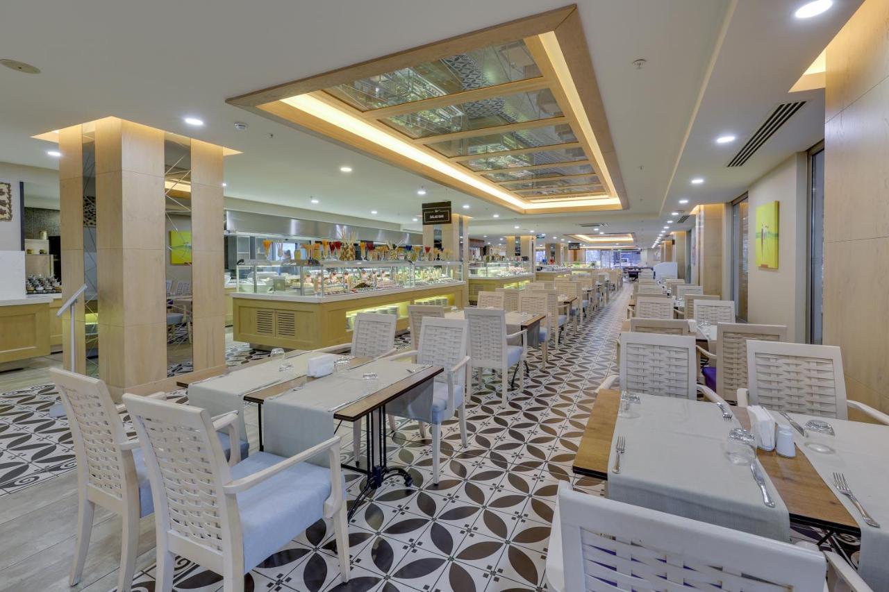 รามาดา โฮเต็ล แอนด์ สวีท บาย วินด์แฮม คูซาดาซิ Hotel คูซาดาซี ภายนอก รูปภาพ