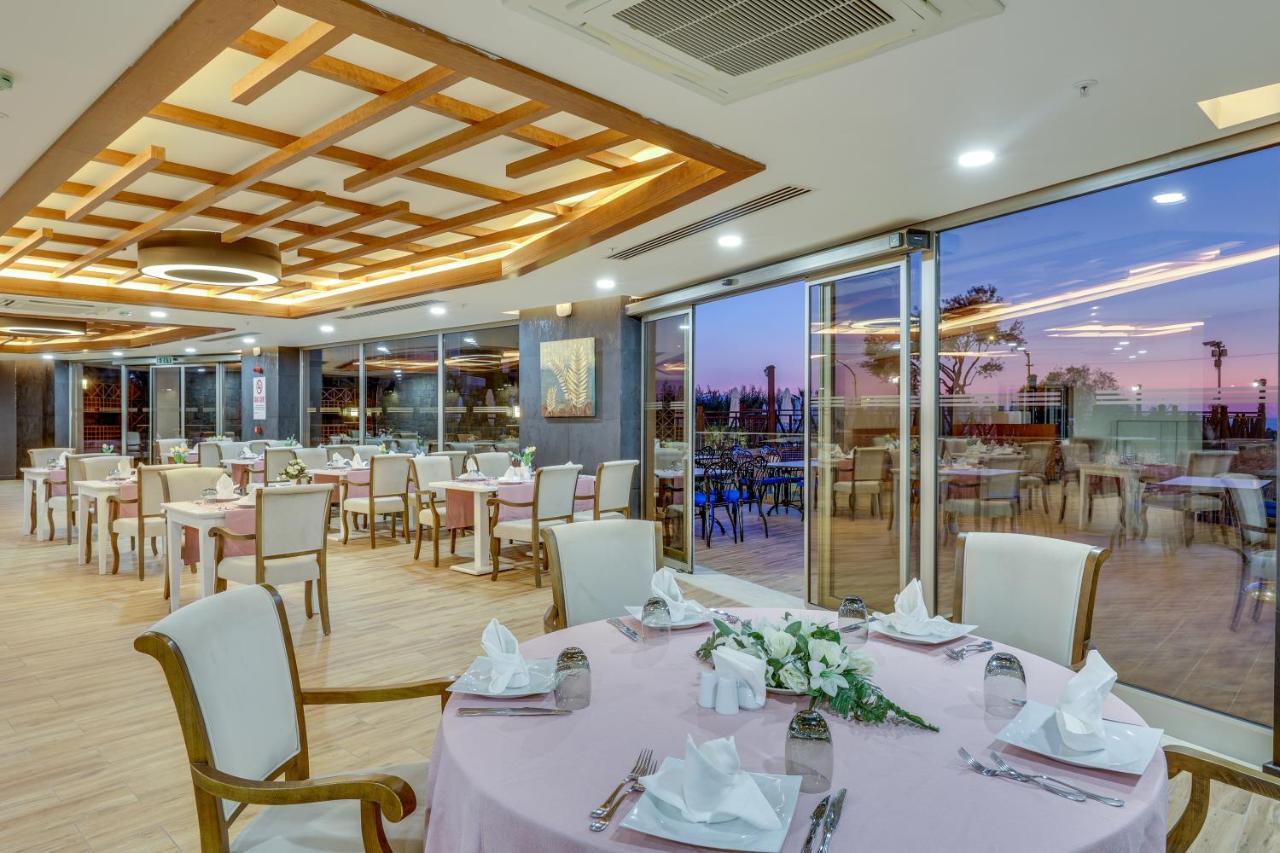 รามาดา โฮเต็ล แอนด์ สวีท บาย วินด์แฮม คูซาดาซิ Hotel คูซาดาซี ภายนอก รูปภาพ